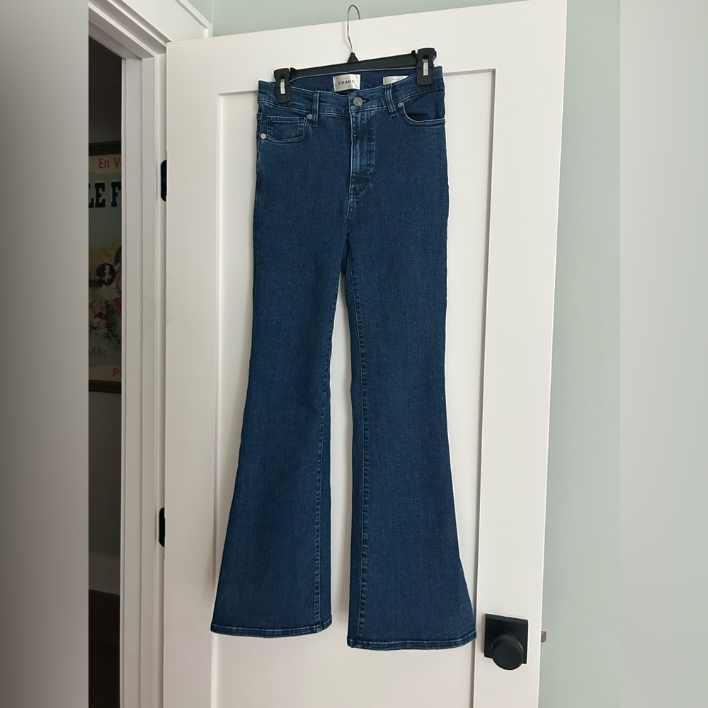 Frame The Icon Flare Jeans
Dark wash denim with high waist and wide leg fit